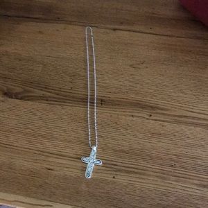 Cross necklace about 30 inc. long.